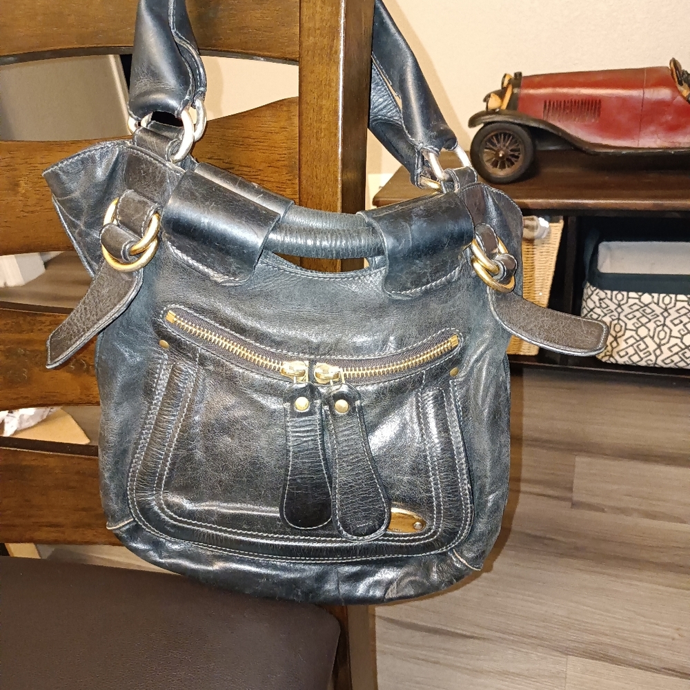Black vintage leather cloe